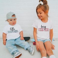 Siblings matching T-Shirts / Or Romper. T-shirt & Romper are 100% cotton.  We design & print our products with care & love! We use the best quality inks & transfers on all products. * * * * * * * * * * * * * * * * * * * * * * * * * * * * * CARE INSTRUCTIONS: Wash inside out on gentle wash, Do not tumble dry. * * * * * * * * * * * * * * * * * * * * * * * * * * * * * SHIPPING: We want to get your product to you as quickly as possible, your purchase will be shipped through Australia post, Express p White Short Sleeve Tops With Custom Name, White T-shirt With Letter Print, Custom Name Cotton T-shirt As Gift, White Crew Neck T-shirt With Custom Name, Custom Name Cotton T-shirt For Family Matching, Cute White T-shirt With Custom Name, Custom Name T-shirt For Family Matching Gift, Family Matching Cotton T-shirt With Custom Name, Custom Name White Crew Neck T-shirt