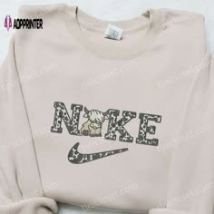 The Cow x Nike Embroidered Tshirt is a unique blend of sporty and chic, featuring a stunning embroidered cow design Cute Nike Sweatshirts Jacket, Nike Check Sweatshirt, Leopard Nike Shirt, Nike Shoes Trendy Gym, Crew Neck Sweatshirt Embroidery Nike, Trendy Hoodies Sweatshirts Nike, Leopard Print Nike Shirt, Embroidered Nike Crewnecks, Nike Cheetah Print Sweatshirt