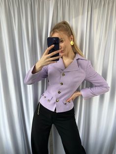 The Vintage lilac feminine blazer is a stylish and elegant women's jacket that features a classic blazer design with a feminine twist. The blazer's color is a lovely shade of lilac, which is a delicate and feminine hue that adds a touch of sophistication to any outfit. The blazer is perfect for a range of occasions, from the office to a night out on the town. It can be dressed up or down, depending on the occasion, and paired with a variety of different tops, bottoms, and accessories to create a Trendy Fitted Double-breasted Blazer, Fitted Trendy Blazer With Double Button Closure, Trendy Fitted Blazer With Double Button, Trendy Fitted Blazer With Double Button Closure, Trendy Fitted Button-up Blazer, Trendy Double-breasted Formal Blazer, Trendy Fitted Blazer With Notch Lapel, Chic Fitted Double-breasted Blazer, Chic Fitted Single Button Blazer