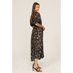 Black printed viscose (100% Viscose). Empire. Short sleeves. V-neck. Pull on. 49.5" from shoulder to hemline. Imported. Printed V-neck Rayon Maxi Dress, Printed V-neck Midi Dress For Daywear, V-neck Printed Midi Dress For Daywear, Printed Viscose Midi Dress For Daywear, Printed V-neck Midi Dress For Evening, Chic Printed Rayon Maxi Dress, Printed V-neck Maxi Dress For Daywear, Black Printed Rayon Dresses, Floral Print Viscose V-neck Midi Dress