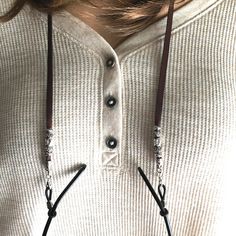 "Combine Tibetan silver boho beads with buttery soft leather and you have an adjustable eyeglass chain and sunglasses holder that will remind you of the Southwest. Eye wear accessories for your unique style. Slide the silver plated bead along the leather at the neckline to adjust the length of this cord. It can adjust up to 32\" long, or as short as you like. Colorful charms dangle at the back of your neck. Made with decorative Czech glass beads in blue and red that are hugged by orange and blue Adjustable Glasses Chains For Everyday Use, Bohemian Adjustable Glasses Chains For Everyday Use, Trendy Adjustable Glasses Chains For Festivals, Trendy Adjustable Glasses Chains For Everyday Use, Handmade Bohemian Glasses Chains For Everyday, Bohemian Handmade Glasses Chains For Everyday Use, Bohemian Handmade Glasses Chains For Everyday, Handmade Adjustable Brown Glasses Chains, Brown Handmade Adjustable Glasses Chains