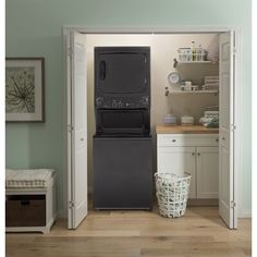 a washer and dryer in a small room