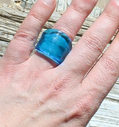 Murano glass ring made with transparent colors. This ring is easy to wear, comfortable and wraps elegantly your finger. The shape is a flat band measuring approximately 25mm-27mm. size could vary as it is handmade. If you like BIGGER RINGS opt for this listing:https://www.etsy.com/listing/724649203/murano-glass-ring-big-glass-rings? Size: US Size 5-6-7-8-9 If you need a different size/color feel free to contact us. Chose your size in the drop down menu and we will make one for you. Please note t Unique Clear Resin Rings, Modern Resin Rings For Gifts, Unique Clear Resin Ring, Handmade Clear Rings For Gifts, Modern Glass Rings Suitable For Gifts, Adjustable Handmade Clear Ring, Clear Resin Rings, Handmade Glass Rings For Gift, Unique Clear Round Rings