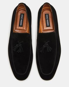 Expertly crafted with a slip-on construction and almond toe, the ONDRE loafer showcases a sleek and sophisticated design. The tassel accent across the vamp adds a touch of elegance, making it the perfect addition to any formal or business casual outfit. .75 inch heel height Suede upper material Textile and synthetic lining Textile and synthetic sock Rubber sole Imported Elegant Suede Slip-ons For Business, Business Slip-on Loafers With Tassels, Modern Black Tassel Loafers For Formal Occasions, Modern Suede Slip-ons For Formal Occasions, Modern Tassel Loafers With Leather Sole For Formal Wear, Modern Tassel Loafers With Leather Sole For Formal Occasions, Formal Plain Toe Loafers With Tassels, Modern Formal Tassel Loafers With Leather Sole, Semi-formal Tassel Slip-on Loafers