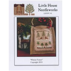 the cover of little house needleworkss winter forest's sample pattern is shown