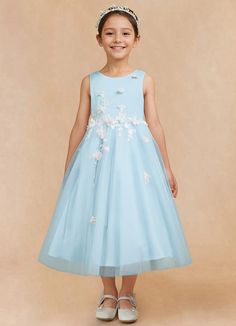 Tillie is our delightful flower girl tulle A-line dress that features a scoop neckline. She has intricate 3D embellishments that add an enchanting feel. The soft tulle A-line skirt offers a light and airy feel, perfect to twirl in. The back is accented with a charming bow that completes this look. Light Blue Long Dress, Satin Flower Girl Dresses, Burgundy Flower Girl Dress, Tea Length Flower Girl Dress, Flower Girl Dresses Blue, Satin Flower Girl Dress, Maternity Bridesmaid Dresses, Light Blue Wedding, Military Ball Dresses