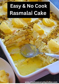 an easy and no cook rasmalai cake in a white dish with a spoon