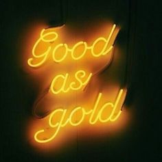 a neon sign that says good as gold