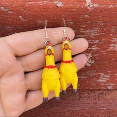 1 Pair of Hilarious Rubber Chicken Earrings  * Hypoallergenic Silver Surgical Stainless Steel Ear Wires Ear Wires (Nickel & Lead Free, Tarnish & Rust Resistant, Great For Sensitive Ears) * Length: 3.15 Inches * Width: 0.75 Inches * Lightweight: 3.0 Grams * Silicone Stoppers Included These tiny rubber chickens feel like the real deal. They will even sqwuak/chirp/squeak if you squeeze their little chicken butts quickly and hard. 😂  I do not make the chicken charms. They are purchased separately a Novelty Hypoallergenic Earrings For Everyday, Gag Earrings, Weird Earings Funny, Toy Earrings, Quirky Hypoallergenic Dangle Earrings, Rubber Duck Earrings, Chicken Earrings, Rubber Chicken, Earrings Funny