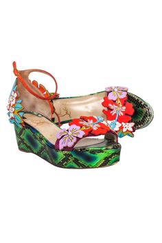 Step into vacation slay with these multi color "Ha Why Luna" platform wedge sandals from Christian Louboutin. Featuring a stunning floral toe detail, these playful wedges will add a touch of quirk to any outfit! Size 6 (36) Made in Italy Pearl and rhinestone floral toe detail Ankle strap buckle Minor blemish at front toe base Platform 1.25" Heel height 2" Green Leather Wedge Sandals For Vacation, Casual Floral Print Wedge Heel Sandals, Multicolor Leather Wedge Sandals For Summer, Multicolor Flat Heel Heels For Spring, Multicolor High Heel Summer Sandals, Multicolor Sandals With Removable Insole For Summer, Spring Beach Floral Print Wedge Sandals, Multicolor Wedge Heel Sandals For Vacation, Multicolor Platform Sandals With Round Toe