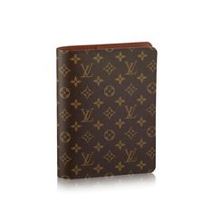 a louis vuitton book with brown trim