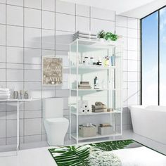 a bathroom with a white bathtub and shelves filled with toiletries next to a window