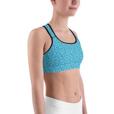 The Black Line range is the latest new design from the Gearbunch Team. The Gearbunch Aqua Black Line Sports Bra is bright aqua blue with striking black abstract lines  This gorgeous sports bra is made from moisture-wicking material that stays dry during low and medium intensity workouts. The bra has support material in the shoulder straps, double layer front, and a wide elastic band to ensure constant support. Be Happy, Be Bright, Be You with Gearbunch. Turquoise Stretch Activewear For Sports, Blue Compression Activewear For Sports Events, Fitted Blue Sweat-resistant Sports Bra, Blue Moisture-wicking Sports Bra For Running, Blue Breathable Activewear For Sports Events, Blue Sweat-resistant Sports Bra For Gym, Blue Sweat-resistant Sports Bra For Running, Blue Sweat Resistant Sports Bra, Blue Breathable Sports Bra With Athletic Fit