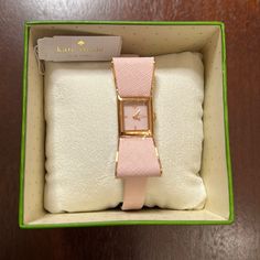 Brand New With Tag In Its Box With Booklet Never Worn The Plastic Wrap Is Still Wrapped Around The Case It Needs A Battery Very Elegant! Beautiful Pink Color! Classic Pink Watch With Rectangular Dial, Classic Pink Watches With Rectangular Dial, Elegant Pink Rectangular Watch, Elegant Pink Rectangular Watches, Luxury Pink Watch With Rectangular Dial, Luxury Pink Watches With Rectangular Dial, Classic Pink Watch For Formal Occasions, Classic Pink Watch As Gift, Classic Pink Watches As Gift