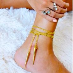 Brand New Boutique Item A Gorgeous Luxury Designer Piece From Jessica Elliott Out Of Los Angeles . 14k Gold Plated Lariat Necklace/Anklet Featuring Dainty Chain With Spiked Ends. Can Be Worn As Shown In Pics Or However You Would Like. Beautiful Piece For Layering , Or Various Boho Looks Any Questions Pls Ask Open To Reasonable Offers Bundle To Save Boho Western Chic Spiked Studded Luxury Gold Lariat Jewelry For Summer, Summer Party Yellow Gold Jewelry, Gold Lariat Jewelry For Festivals, Gold Ankle Wrap Bracelets For Festivals, Summer Gold Jewelry With Adjustable Chain, Gold Lariat Necklace For Festival, Adjustable Dangle Anklets With Chain, Gold Adjustable Dangle Anklets, Gold Dangle Anklets With Adjustable Fit