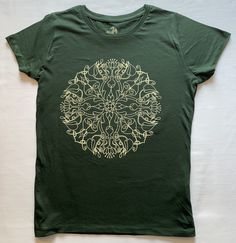 "Originally drawn by hand on paper. High quality screen print on 100% organic cotton T shirt. Ladies Mandala T shirt, 100% organic cotton 150gsm side seamed for a fitted look, 100% OCS Organic ring-spun Combed Cotton for a super soft feel. Size Chest (to fit): S - 34-36\" // M - 36-38\" // L - 38-40\" Note the colour may look slightly different from actual item depending on your computers monitor and settings. Dispatched in packaging which can be recycled or composted." Winter T Shirts, Organic Rings, Organic Ring, Art Shirts, Screen Print, Combed Cotton, Cotton T Shirt, Womens Tees, Cotton Tshirt