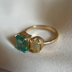 This gorgeous ring is handmade with traditional metalworking techniques Made with an emerald, opal, and 14k yellow gold Size 7.5 but inquire for size adjustments Emerald And Opal Engagement Ring, Emerald And Opal Ring, Opal Wedding Ring, Opal Engagement Ring, Opal Wedding, Opal Wedding Rings, Malachite Rings, Gorgeous Ring, Ocean Jewelry