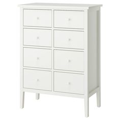 a white dresser with six drawers