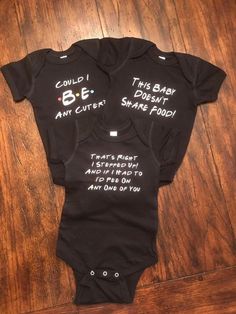 "This is a 3 pack of baby bodysuits inspired from the hit 90's sitcom \"Friends\". The three designs say: \"That's right I stepped up! And if I had to I'd pee on any one of you\" \"Can I be any cuter\"? \"This Baby Doesn't Share Food\" Note, you can personalize this design with the baby's name. Just write to me in the note box at checkout, to let me know to change it. Also, if you would like any of the quotes to be changed out for a different phrase, please message me to see if it will fit. Our 90s Sitcoms, Diy Baby Clothes, 90s Tv, Gender Neutral Baby Clothes, Write To Me, Baby Gift Sets, Gender Neutral Baby, Etsy Baby, Baby Sets