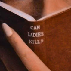 a woman is reading a book with the words can ladies kill? written on it