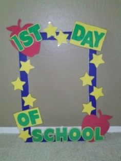 an apple and stars frame with the words 1st day of school written on it's sides