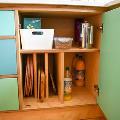 an open cabinet with many items in it