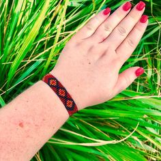 "Red Seed Bead Bracelet delicately handmade by an indigenous Mayan family of women in Guatemala. This is a must have even as an every day accessory! Makes for a great birthday gift, Christmas gift, holiday gift, stocking stuffer, friendship bracelet and especially a \"just because\" gift! These bold glass bead bracelets never seize to impress! *Please note that all of our items are handcrafted and unique to each piece. Also, colors may vary slightly based on your device. Like what you see here? Adjustable Southwestern Bracelets As Gift, Adjustable Southwestern Style Bracelets As Gift, Artisan Red Beaded Bracelets For Festivals, Adjustable Southwestern Style Bracelets For Gifts, Handwoven Beaded Bracelets With Round Beads, Adjustable Red Southwestern Bracelets, Handmade Red Bohemian Beaded Bracelets, Southwestern Style Adjustable Red Bracelets, Bohemian Orange Beaded Bracelets For Gifts