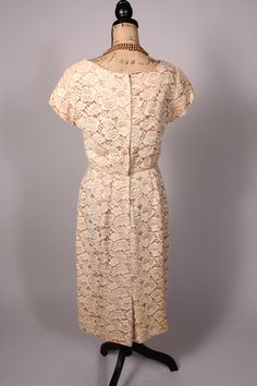 "50s Dress Lovely vintage 50s cream lace over tan satin dress with short sleeves! So pretty and very well-made, probably hand made, but very well done! Classic! Zips up the back with original metal zipper. Bust:42\" Waist:29\" Hips:44\" Length:44\" Sleeve:5.5\" Necklace not included. 2603" Vintage Cream Lace Dress, Vintage Short Sleeve Lace Dress, Vintage Lace Dress With Short Sleeves, Satin Dress With Short Sleeves, Black Chiffon Cocktail Dress, Online Vintage Stores, Vintage Dress 60s, Chiffon Cocktail Dress, Orange Scarf