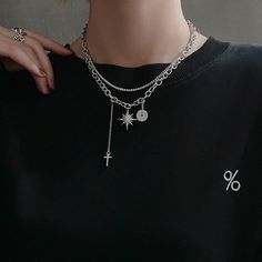 Unisex Gothic punk dark style to elevate your fashion vibes! Double layering silver chain necklace choker with crystal north star charm, cross drop pendant, and silver donut ring charm. Very chic and stylish for men and women, an eye-catching posh necklace to show your unique edgy taste. 💎 Features: ♥ Handcrafted ♥ Finish Tone: silver ♥ Side Stone: cubic zirconia ♥ Double layer, Adjustable closure ♥ Approximate Measurements: - Length: 18" with 2.5" adjustable ♥ Nickel/Lead Free, Hypoallergenic, Jewelry For Men Necklaces, Layering Chains, Edgy Necklace, Dark Necklace, Chain Necklace Women, Donut Ring, Star Choker, Punk Necklace, Double Necklace