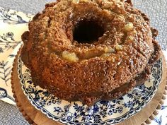 a bundt cake sitting on top of a blue and white plate