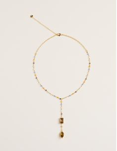 Celestial Lariat Necklace | En Route Jewelry En Route Jewelry, Gold Lariat Necklace, Y Necklace, Hard Metal, Brass Glass, Pearl Flower, Lariat Necklace, Sewing Inspiration, Jewelry Plate