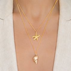 M&M layer sets: We've selected our favorite necklace styles, and put them together in the most perfect way. Wear them with a classic button down, a lace camisole, or a simple graphic tee. Each set is versatile enough to wear with anything. Made to Order. 14k Gold Filled 2 individual necklaces sold together as a SET. 1) 16" curb chain featuring a Starfish 2) 20" curb chain featuring a Conch Shell pendant Please allow up to 7 business days for processing PRIOR to shipping, which may take an additi Elegant Summer Jewelry For Layering, Elegant Everyday Summer Necklace, Elegant Summer Charm Necklaces, Necklace Styles, St Barts, Simple Graphic, Lace Camisole, Conch Shell, Shell Pendant