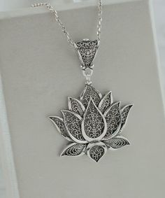 Luxury Handmade Flower Pendant Necklace, Bohemian Sterling Silver Jewelry With Flower Charm, Bohemian Sterling Silver Necklace With Intricate Design, Bohemian Sterling Silver Flower Necklace, Spiritual Sterling Silver Flower Shaped Jewelry, Spiritual Sterling Silver Flower Jewelry, Bohemian Jewelry With Intricate Flower Pendant, Traditional Flower Shaped Jewelry For Gift, Traditional Flower-shaped Jewelry For Gifts