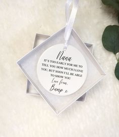 a white ornament with a poem on it