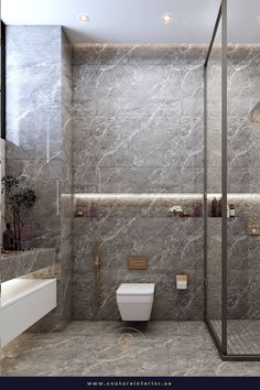 a modern bathroom with marble walls and flooring