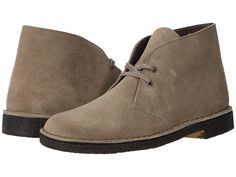 Clarks Desert Boot - Men's Lace-up Boots : Grey Suede : Please note: colors may look a little lighter in photo due to professional studio lighting. Stylish and versatile, the original Clarks Desert Boot launched in 1950 by Nathan Clark and was inspired by a rough boot from Cairo's Old Bazaar. An instant hit, it became the footwear of choice for off-duty army officers. Premium leather is teamed with an unfussy lace fastening and our signature crepe sole. Soft, supple suede and full grain leather Classic Outdoor Boots With Suede Lining, Classic Outdoor Desert Boots With Round Toe, Classic Ankle Desert Boots, Clarks Desert Boots Men, Mens Lace Up Boots, Clarks Desert Boot, Men's Clarks, Desert Boot, Grey Suede