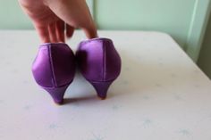 "1980s dyeables heels lovely purple satin size 6.5 womens love good vintage condition PERFECT with a pink dress:) 9.5\"tip to tip (taken from inside heel) 3.5\"ball 2\"heel Thank YOU and please feel free to ask me any ?s:) Have a lovely day!! xoxo www.etsy.com/shop/retroandme" Purple Pointed Toe Heels For Wedding, Purple 4-inch Heel Wedding Heels, Fitted Purple Heels With 4-inch Heel, Purple Heels With 4-inch Almond Toe, Purple Almond Toe Heels With 4-inch Heel, Fitted Purple Heels With Closed Toe, Fitted Purple Closed Toe Heels, 80s Glam, Wedding Glam