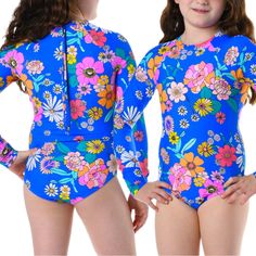 Hobie Kids’ Peace Floral Long Sleeve One-Piece Rashguard Swimsuit Sea Blue 10y Flower Power Makes A Comeback In This One-Piece Rashguard Swimsuit With Raglan Long Sleeves. Upf 50+ Sun Protection 84% Nylon, 16% Elastane Hand Wash, Line Dry Playful Long Sleeve Spring Bodysuit, Playful Long Sleeve Swimwear For Pool, Playful Long Sleeve Fitted Bodysuit, Multicolor Spring Bodysuit For Playwear, Spring Multicolor Bodysuit For Playwear, Pink Fitted Printed Onesie, Cute Stretch Blue Swimwear, Cute Blue Stretch Swimwear, Fitted Fun Bodysuit For Playwear