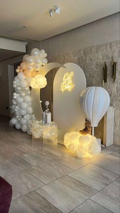 balloons and lights are on display in the room