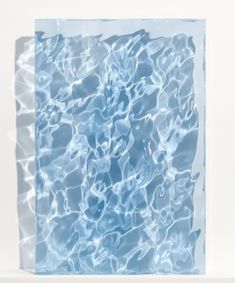 an abstract photograph of water in a pool