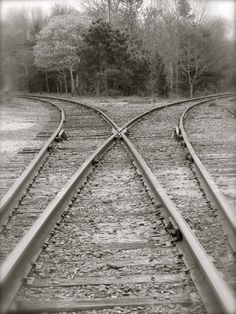 black and white photograph of two train tracks