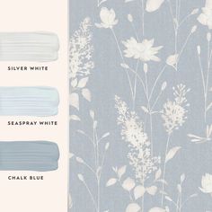 three shades of blue and white with flowers on the wall next to eachother