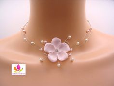 Fancy necklace of light pink wedding of French manufacture.This light pink necklace is made with two rows of pearly pearls in pink and ivory glass or white and a pink powdered satin flower in the center.The necklace measures 42 cm in length adjustable up to 45 cm (other size to indicate in the box message of your basket)Size of the flower: 3,5 cmManufacture of this necklace within 5 working days upon receipt of your paymentCareful shipping with tracking number for all destinations Pink Wedding Necklace With Flower Charm, Powder Pink Wedding, Elegant Pink Flower-shaped Jewelry, Pink Flower-shaped Evening Jewelry, Adjustable Pink Flower-shaped Necklace, Black And White Necklaces, Fantasy Ring, Costume Jewelery, Light Pink Wedding