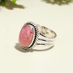 Rhodochrosite Ring, Sterling Silver Ring, Split Band Ring, Bestseller Ring, Handmade Ring, Everyday Wear Accessories For Women, Pretty Ring*  Metal :- 925 Sterling Silver Style : Ring Gemstone:-Rhodochrosite Benefits Of Rhodochrosite Rhodochrosite is mainly used as an ore of manganese, which is a key component of low-cost stainless steel formulations and certain aluminium alloys. Quality banded specimens are often used for decorative stones and jewellery. Occasion : Birthday Events, Lovely Valentine's Day Gift, Anniversary Gift, Weeding Gift, Engagement Ring, Lover Gift Ring, Hen Party And Other Occasion.... Your order will be handmade and ready for shipment in 1 to 1 business days Normally we ship via UPS it takes 3 to 4 weeks if you need faster delivery You can select Shipping in your ca Bohemian Pink Rings For Anniversary, Bohemian Pink Ring For Anniversary, Pink Rings With Natural Stones For Anniversary, Pink Bohemian Rings For Jewelry Making, Pink Oval Spiritual Ring, Decorative Stones, Ring Everyday, Pretty Ring, Pretty Rings