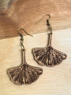 These earrings are lightweight and fit any occasion!  All earrings are made with hypoallergenic ear pieces and natural wood. Ginko Earrings, Ginkgo Leaf Earrings, Brown Dangle Earrings Nature-inspired, Handmade Leaf-shaped Botanical Earrings, Bohemian Brown Leaf-shaped Earrings, Ginkgo Leaf, Light Weight Earrings, Leaf Earrings, Natural Wood