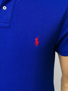 Electric blue cotton embroidered logo polo shirt from Polo Ralph Lauren featuring a slim fit, a classic polo collar, a front button placket, short sleeves, ribbed cuffs, a straight hem and side slits. | Polo Ralph Lauren Embroidered Logo Polo Shirt Blue Polo Shirt With Embroidered Logo, Ralph Lauren Fitted Blue Polo Shirt, Luxury Blue Relaxed Fit Polo Shirt, Ralph Lauren Blue Polo Shirt, Polo Shirt Logo, Shopping Online Logo, Polo Pony, Blue Cotton Polo Collar T-shirt, Cotton Polo Shirt