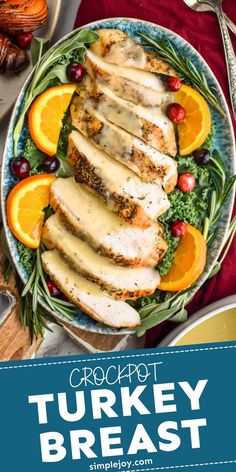 a plate with sliced chicken, oranges and cranberries