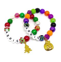 These adorable bracelets are the perfect favor for your little one's classroom party! Each bracelet features an antique silver Christmas charm, resin rhinestone beads and an assortment of red, green and white 10mm acrylic beads strung with durable stretch floss cord. Each bracelet will arrive individually packaged in organza bags. You will receive a mix of Christmas themed charms. If you would like a mix of boy's and girl's bracelets, just leave a note during checkout with the quantity needed of Personalized Red Beaded Bracelets For Birthday, Playful Red Stretch Bracelet For Gift, Themed Green Beaded Bracelets For Gifts, Themed Green Beaded Bracelets As Gift, Green Themed Beaded Bracelets As Gifts, Playful Green Stretch Bracelet As Gift, Green Personalized Novelty Bracelets, American Girl Birthday Party, Ballerina Jewelry