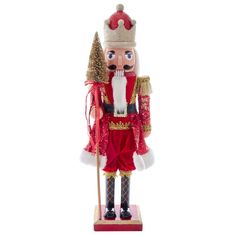 a nutcracker is dressed in red and gold