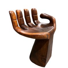 a wooden chair made to look like a hand